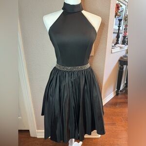 Sherri Hill size 4 black halter dress with beaded waistline.